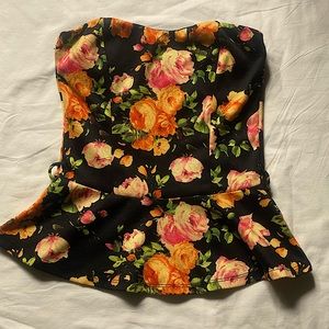 Peplum style sleeveless Black and Orange Floral top Size Small